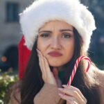 woman experiencing a dental emergency over the holidays