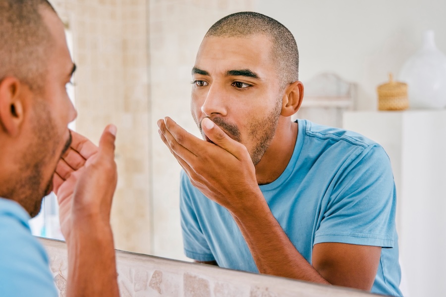 man with halitosis or bad breath